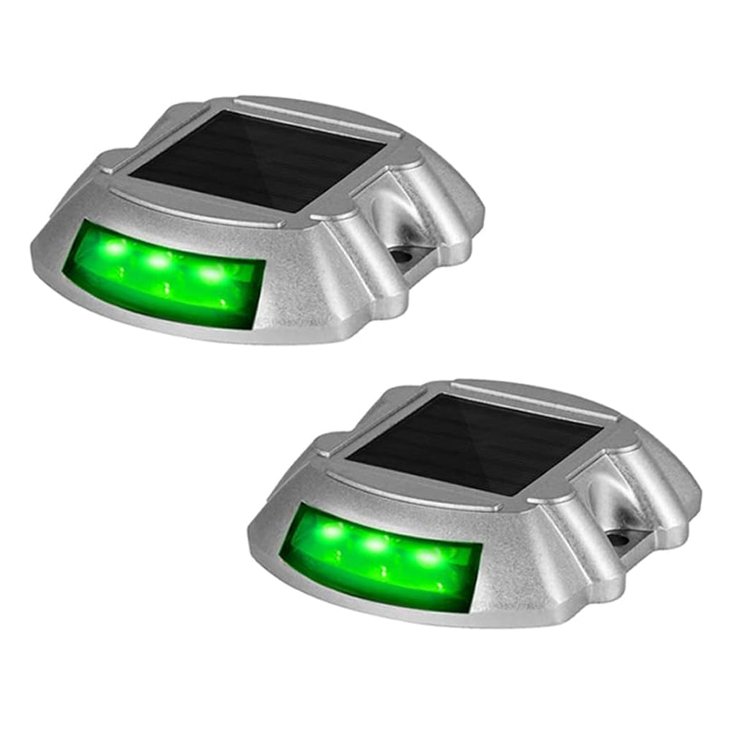 Pair of solar-powered driveway deck marker lights with silver metallic casing and green LED illumination—designed for outdoor safety, clear nighttime guidance, and easy installation with top-mounted solar panels and durable build.