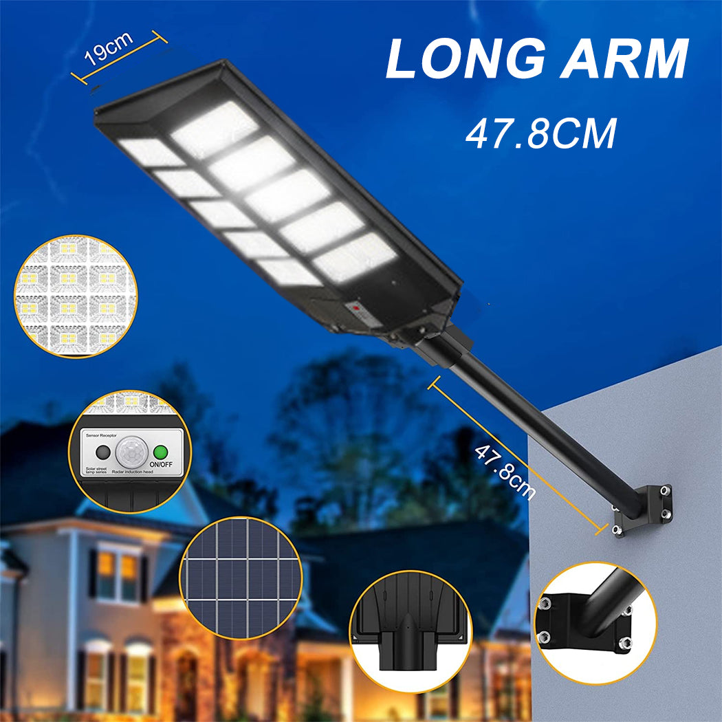 Solar-powered LED street light mounted on a wall with a 47.8cm long adjustable arm, designed for easy installation on residential posts or building exteriors. Includes multiple LED panels, integrated solar panel, and motion sensor switch—ideal for secure outdoor lighting.