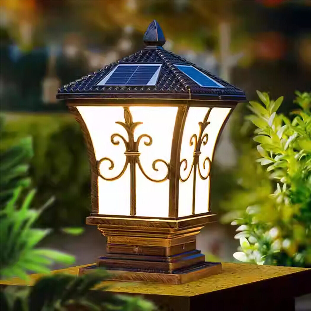 "An ornate Victoria antique-style solar pillar light casting a warm glow over a garden pathway. This decorative solar post light features intricate metalwork and a classic design, blending timeless elegance with modern efficiency. Weatherproof and durable, it automatically illuminates at dusk for up to 8 hours via solar power or optional E27 bulb. Perfect for enhancing gardens, driveways, and historic-inspired outdoor spaces