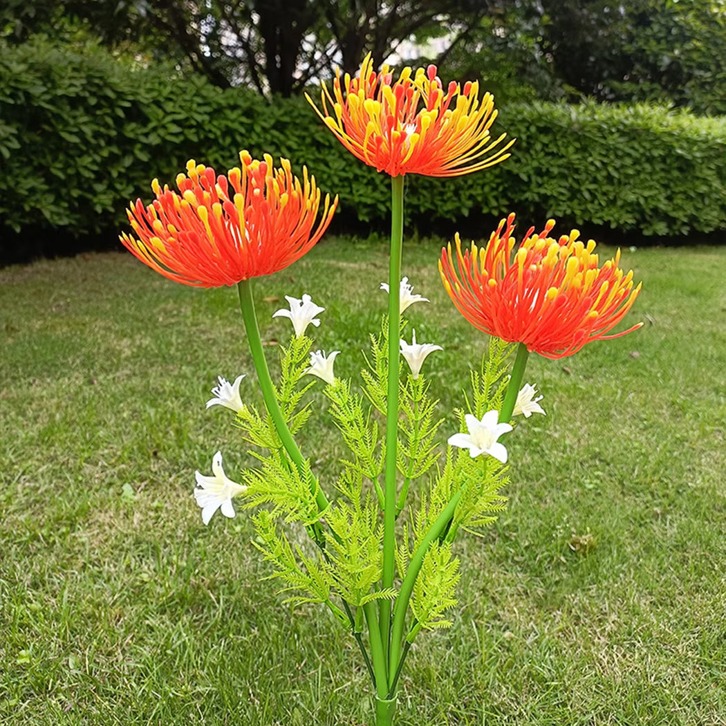 Solar-powered red chrysanthemum garden light with realistic petals and vibrant color. Eco-friendly outdoor décor that charges by day and glows at night.