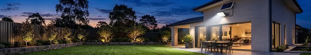Rainman K Series solar flood light illuminating an Australian home and outdoor area