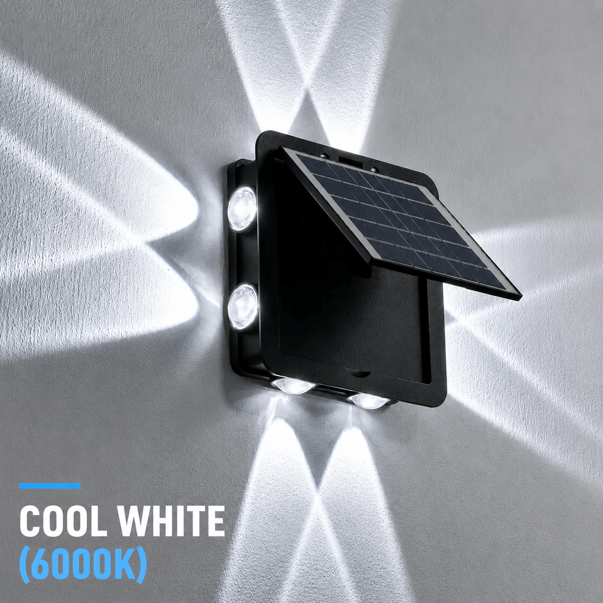 A close-up of the 6000K cool white 4-way solar outdoor wall light showing bright, crisp white light beams radiating across a neutral wall surface.