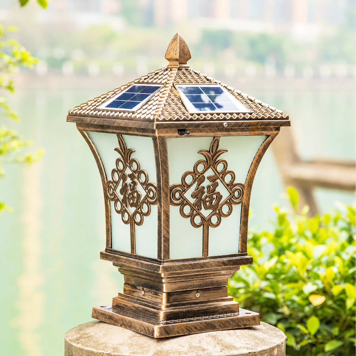 Heritage solar coach lamp and pillar post light on a concrete garden gate pillar in Australia.