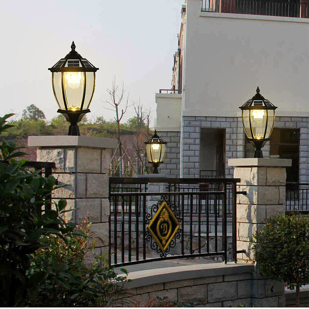An elegant antique solar-powered post lamp with a sanded black die-cast aluminum frame and beveled clear glass panels, perfect for outdoor spaces. Featuring dusk-to-dawn automation, five light modes, and a remote control, it provides energy-efficient, weather-resistant illumination. No wiring required for easy installation. Stylish, durable, and backed by a 30-day guarantee.
