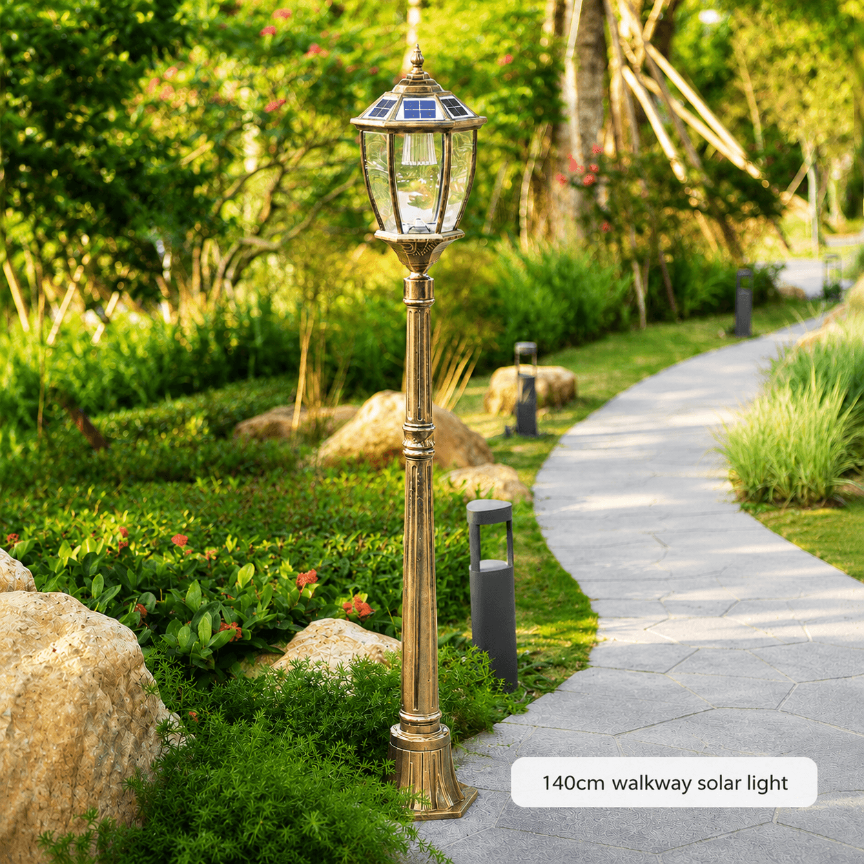 A 140cm bronze solar lamp post installed along a paved walkway garden border as a decorative solar garden light.