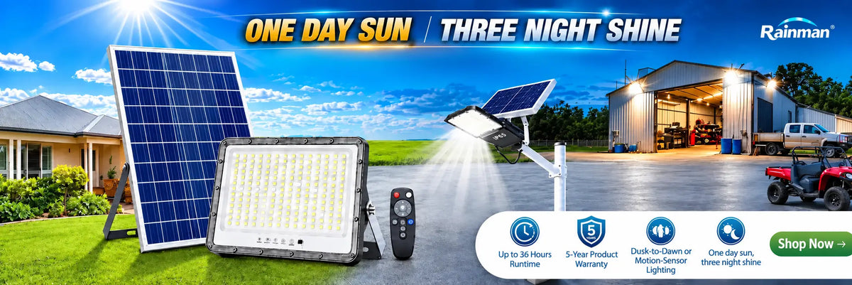 Rainman commercial outdoor solar flood lights and panel kit illuminating a driveway and warehouse building, featuring a 5-year warranty.