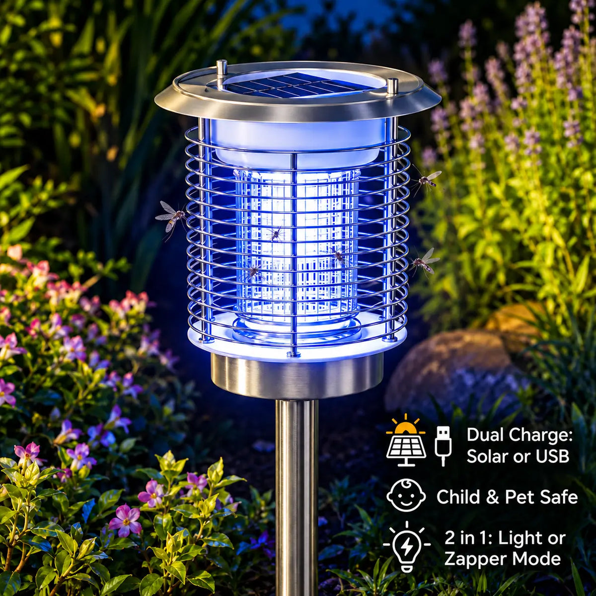 The silver variant of the solar mosquito zapper and garden light mounted on its ground stake in a garden at night, illuminating a blue-violet light with features for dual USB or solar charging and multi-mode options.