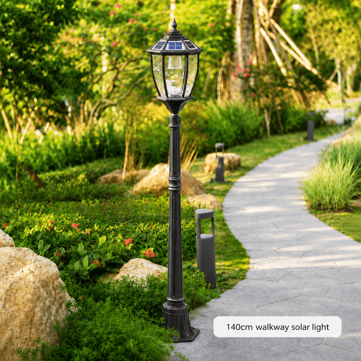 A 140cm victorian solar post light installed beside a paved garden path as a solar pathway post light for walkway lighting in Australia.